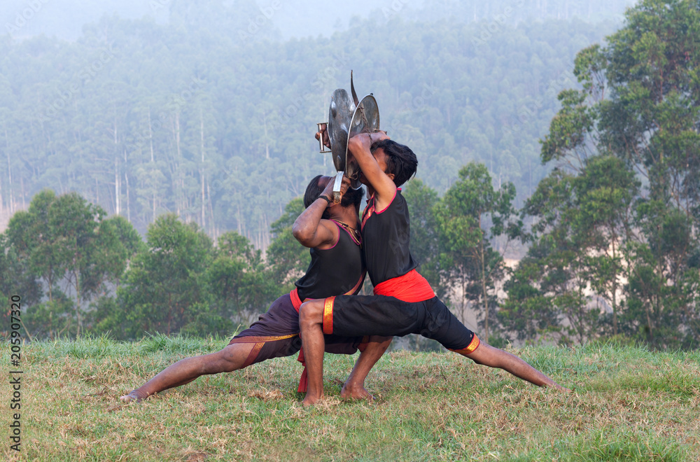 Weapon combat Kalaripayattu Martial Art in Kerala, India Stock Photo