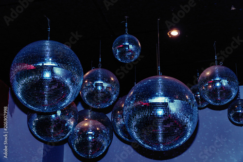 Disco balls in a nightclub room
