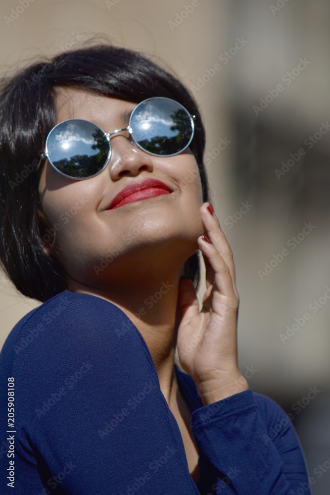 Latina Female Wondering Wearing Sunglasses Latina Female Wondering Wearing Sunglasses
