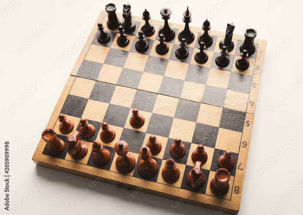 Chessboard with figures in progress Chessboard with figures in progress