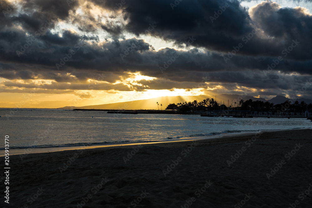 Beautiful Sunset at the Waikiki Beach in Honolulu / Hawaii