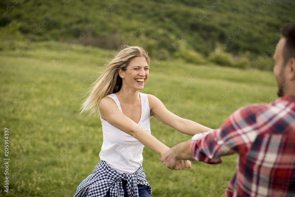 Loving coulpe having fun in the spring nature Loving coulpe having fun in the spring nature