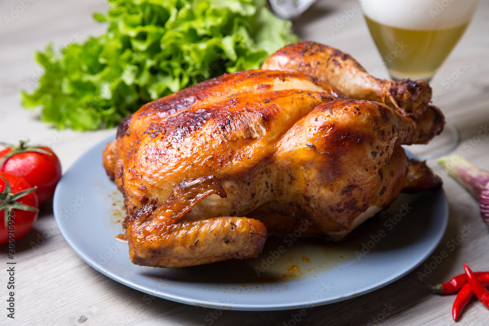 Chicken baked whole. Selective focus, close-up.