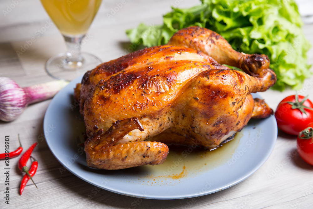 Chicken baked whole. Selective focus, close-up. Chicken baked whole. Selective focus, close-up.