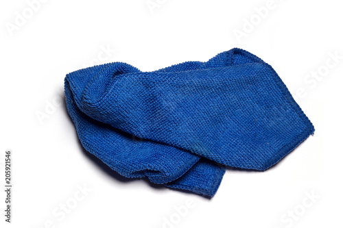 Blue rag to wipe the dust on a white background