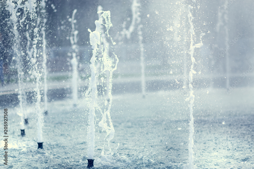 Spurting water from a fountain. Shallow depth of field. Spurting water from a fountain. Shallow depth of field.