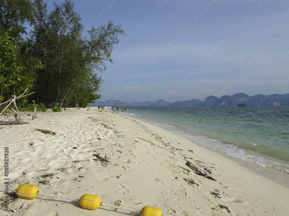 Landscape: white sand on the beach and azure sea Landscape: white sand on the beach and azure sea