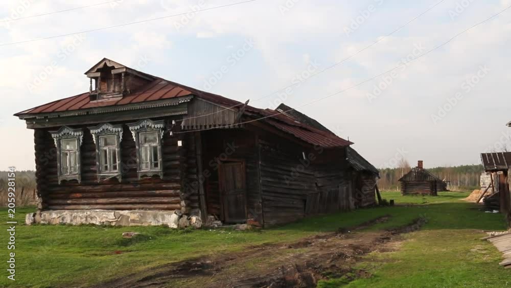 Old Russian village abandoned house on an abandoned field. Old Russian village abandoned house on an abandoned field.