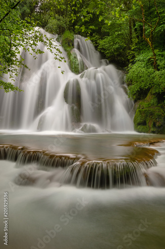 French landscape - Jura. Waterfall in the Jura mountains after heavy rain.