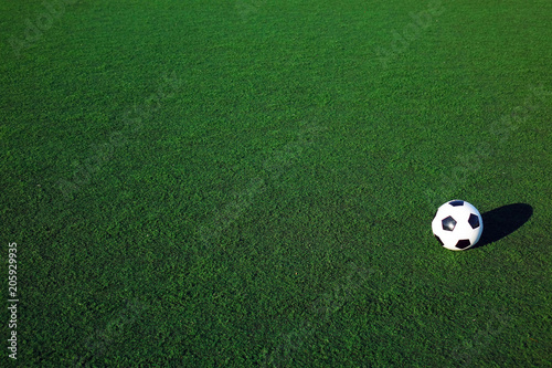 Football on a green field
