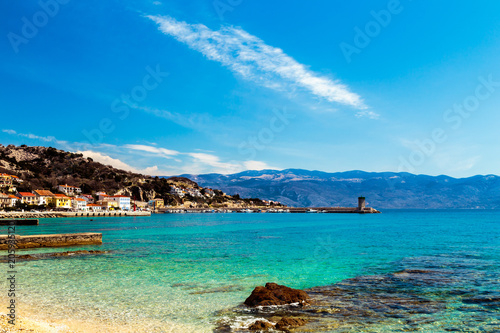 Baska and its beach in a sunny day, Krk Island, Dalmatia, Adriatic Coast, Croatia.