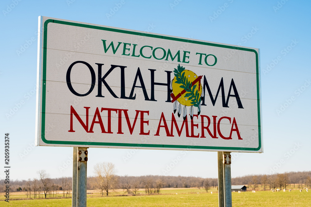 Welcome ot Oklahoma Sign on a sunny blue sky day Welcome ot Oklahoma Sign on a sunny blue sky day