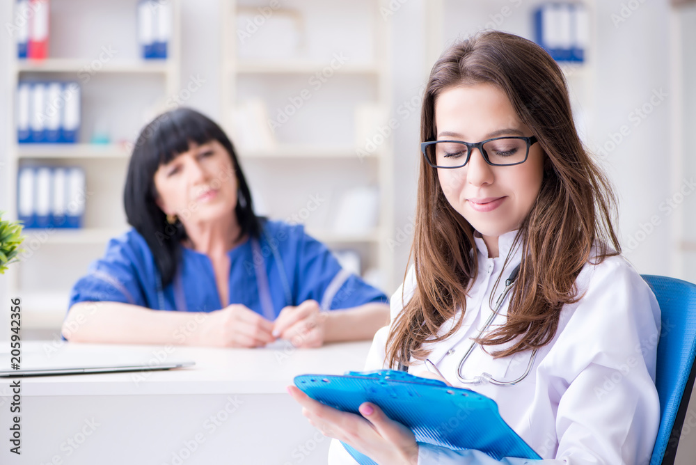 Senior patient visiting doctor for regular check-up Senior patient visiting doctor for regular check-up