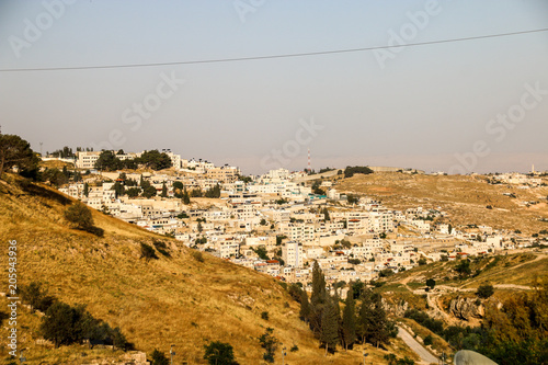 View of East Jerusalem with the Wall to the West Bank in the background.