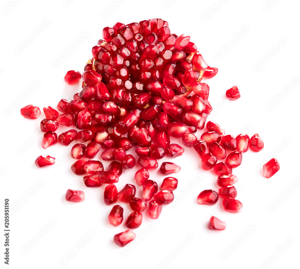 heap of pomegranate seeds isolated on white background heap of pomegranate seeds isolated on white background
