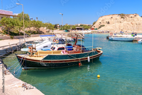 Fishing boats moored In Kolymbia harbor. Rhodes island. Greece