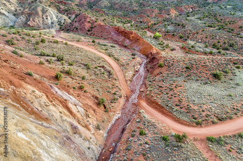 canyon road and creek - aerial view