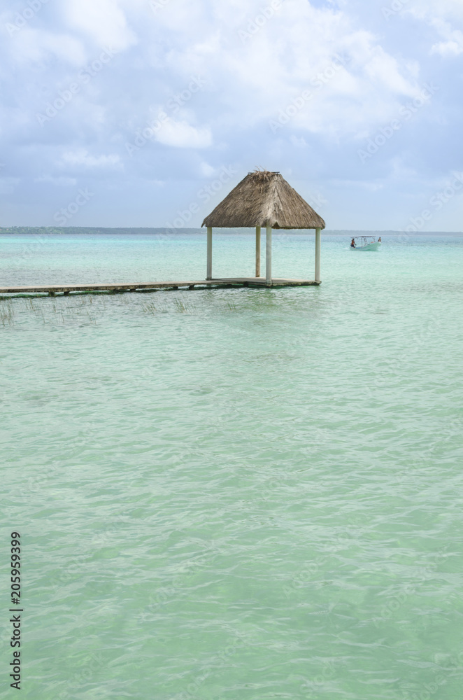 Peaceful and abandoned pier in a Mayan lagoon area 