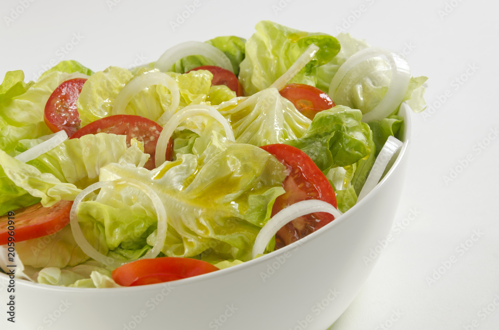 Fresh salad in a white bowl Fresh salad in a white bowl