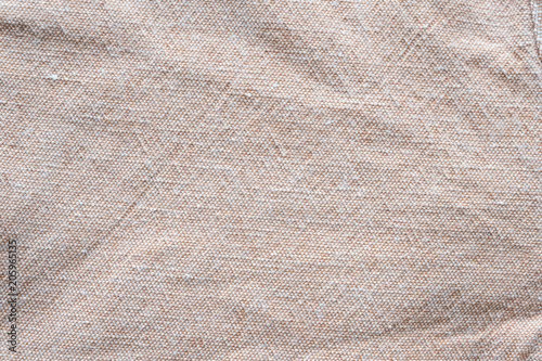 Wrinkled brown cotton fabric textured background, Fashion pattern textile design concept background