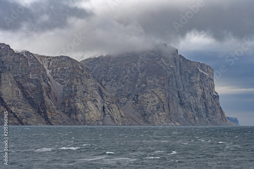 Looming Cliffs on a Coastal Fjord © wildnerdpix