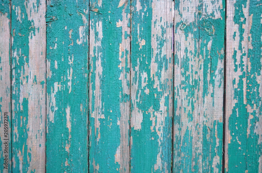 Background consisting of a texture of boards with peeled paint.
