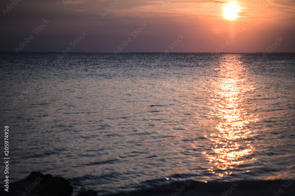 Obraz premium Sunset over the sea