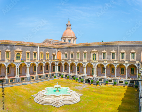 View of an inner courtyard of the University of Catania residing in the former monastery of benedettini di san Nicolo, Sicily, Italy photo