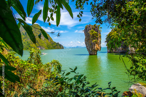 Thailand James Bond stone Island, Phang Nga. Thailand. A view of a rock standing in the water. Sea trip to the islands of Phuket. photo