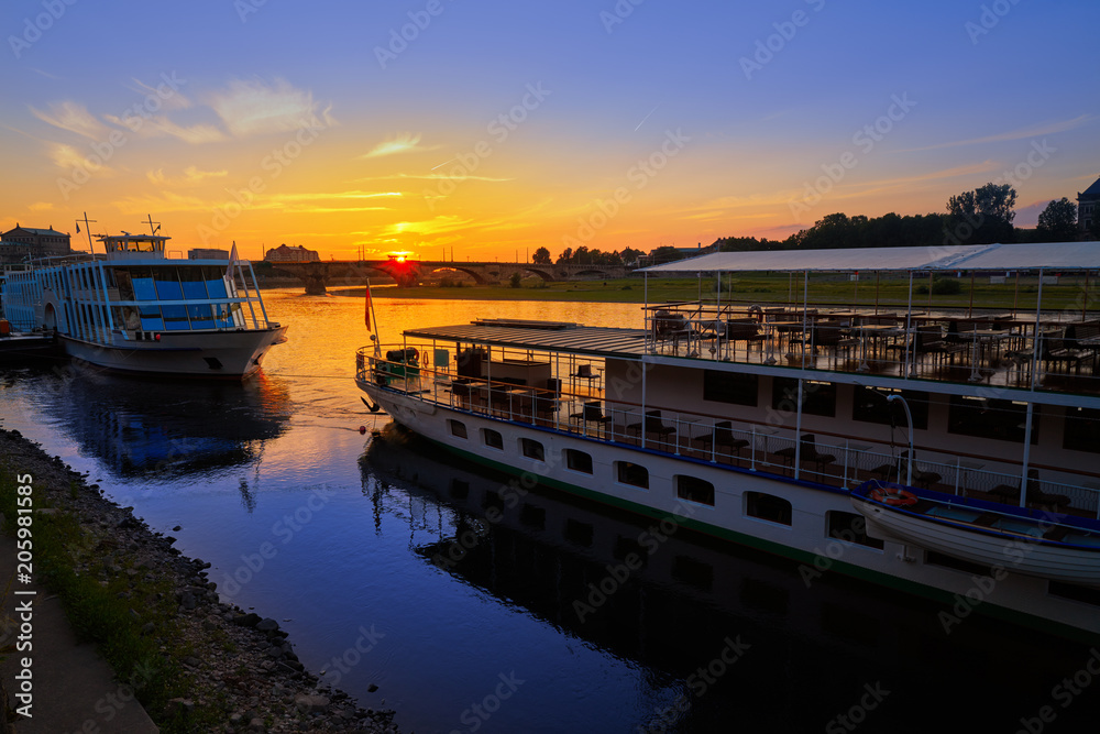 Fototapeta premium Dresden Elbe river and boats in Saxony Germany