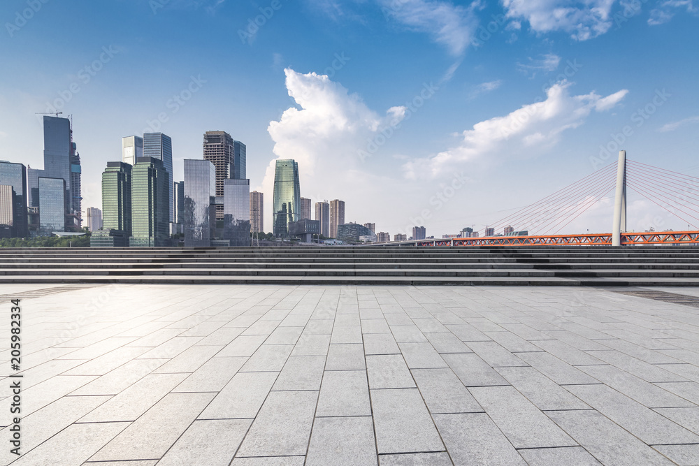 Panoramic skyline and modern business office buildings with empty road,empty concrete square floor