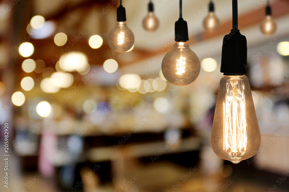 Vintage Lighting lamp in the restaurant cafe. - obrazy, fototapety, plakaty 