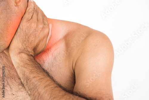 Closeup unhappy man suffering from neck pain and injury on white background. Health care and medical concept.