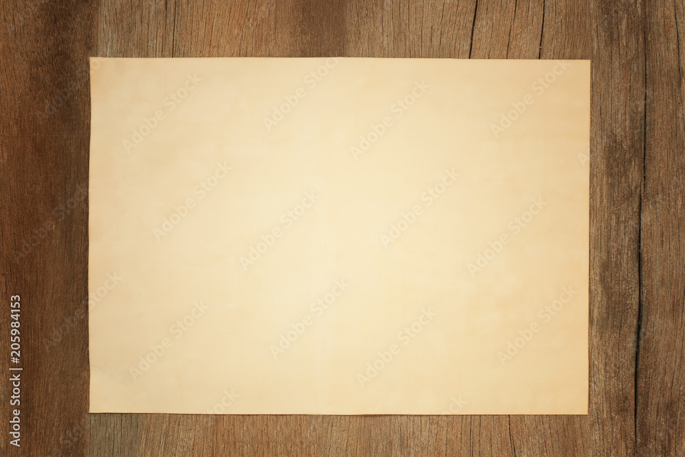 Old blank paper on vintage wooden floor and have copy space.