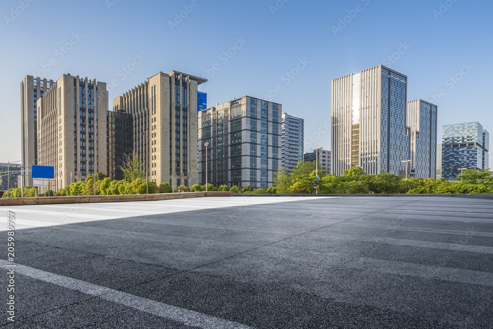 Empty Road with modern business office building Empty Road with modern business office building