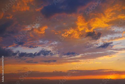 sunset sky in orange and blue © lunamarina