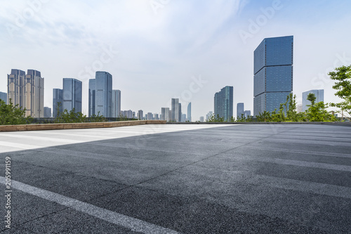 Panoramic skyline and buildings with empty road © MyCreative