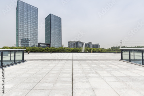 Empty floor with modern business office building