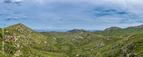 Fototapeta Naklejka Na Ścianę i Meble -  Mallorca, Aerial panorama of green spanish nature mountain sea landscape in springtime XXL