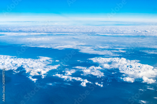 Blue sky and Cloud Top view from airplane window,Nature background