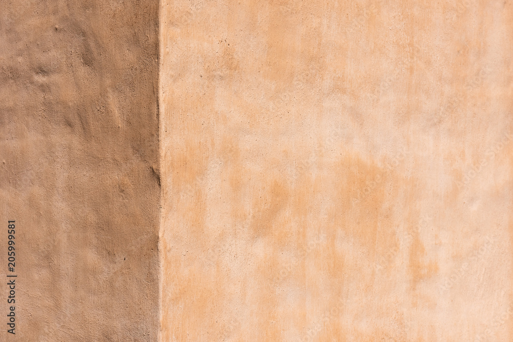 Fototapeta premium empty light brown concrete wall textured background