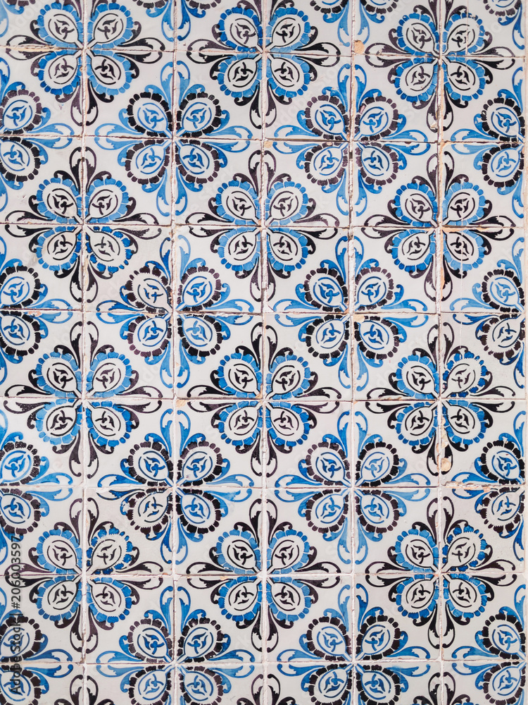 Ceramic azulejos portuguese tile wall. art of old city