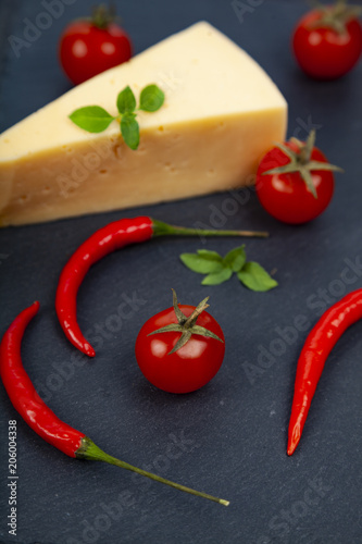 Cheese, cherry tomatoes,chilli and basil