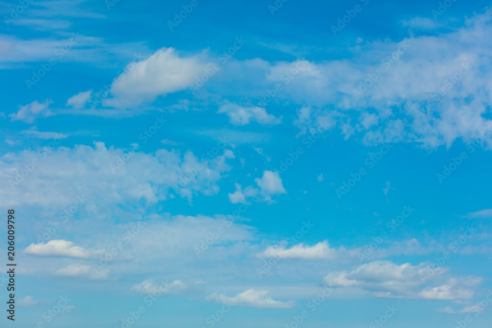 Clouds on a blue sky as a background Clouds on a blue sky as a background