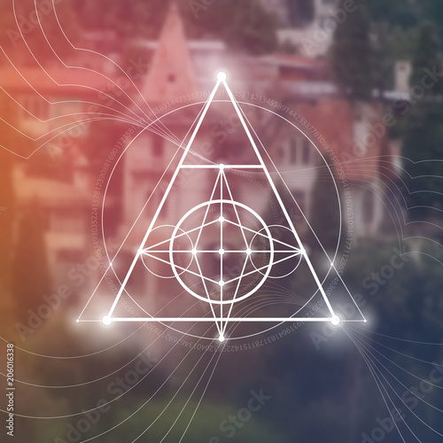 Interlocking circles and triangles hipster sacred geometry illustration with golden ratio digits in front of photographic background.