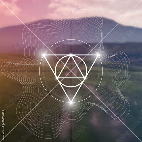 Interlocking circles and triangles hipster sacred geometry illustration with golden ratio digits in front of photographic background.