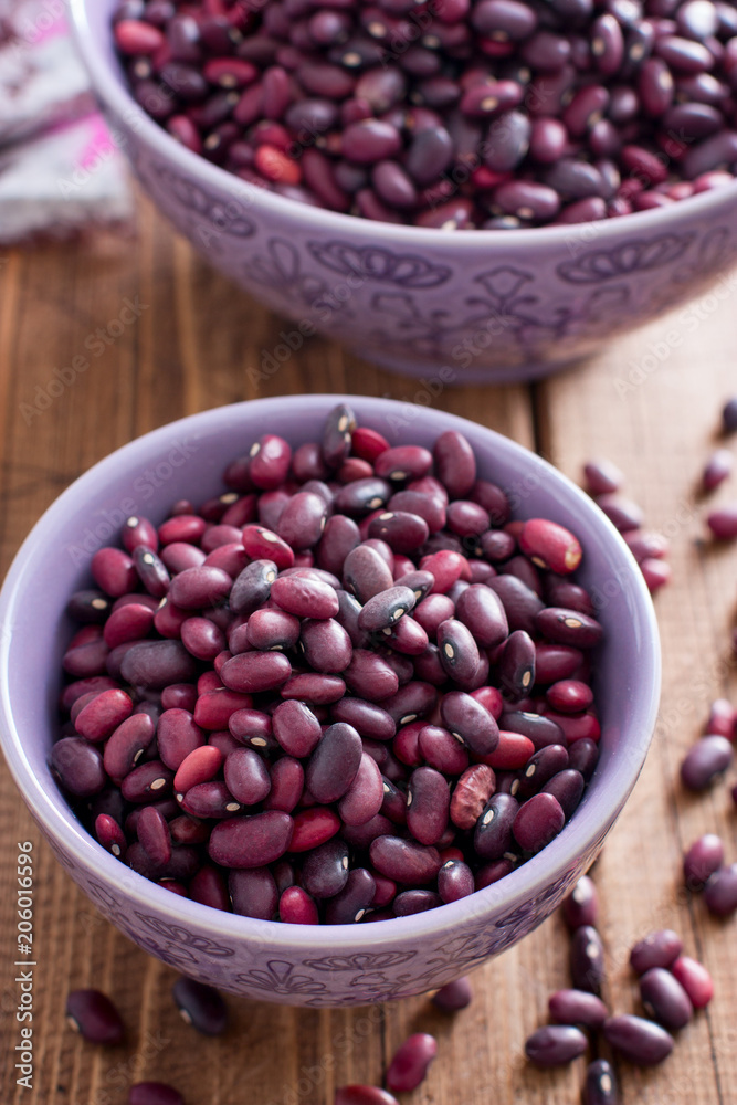 red beans dry in two bowls, selective focus red beans dry in two bowls, selective focus
