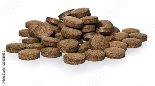 Herbal pills from Ashwagandha (Withania somnifera), Indian ginseng. Ayurvedic medicine herb.