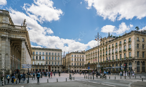 Bordeaux, France, 9 may 2018 -The grand Opera House 'Grand Théâtre de Bordeaux' and the Main square 'Place de La Comedie' in the center of town filled with tourist finding their way