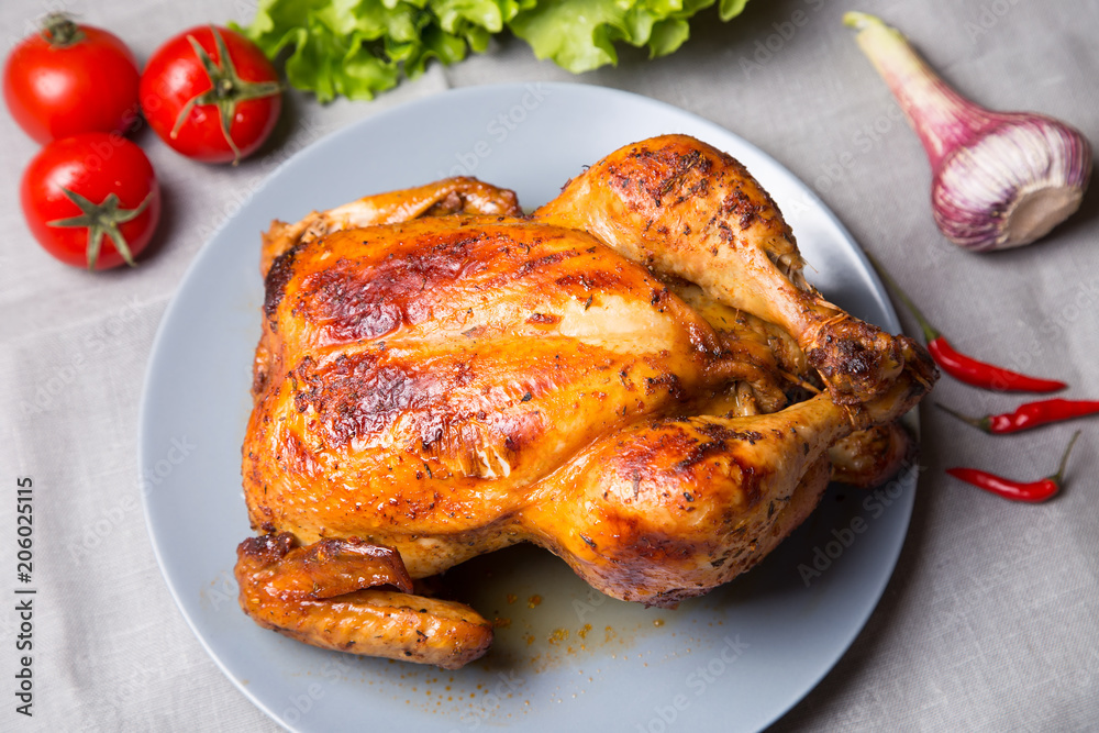 Chicken baked whole. Selective focus, close-up. Chicken baked whole. Selective focus, close-up.